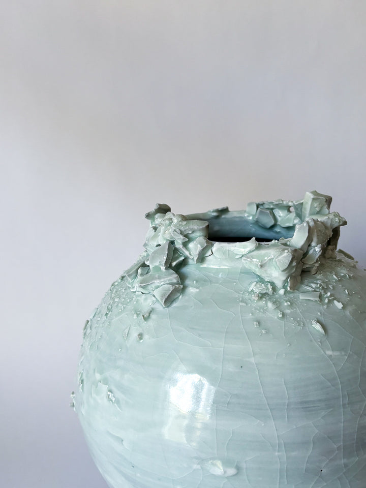 Porcelain High-fire ceramic artwork by Hugh Remar. Example pieces for an intermediate ceramics class focusing on porcelain clay making and decorating methods. 
