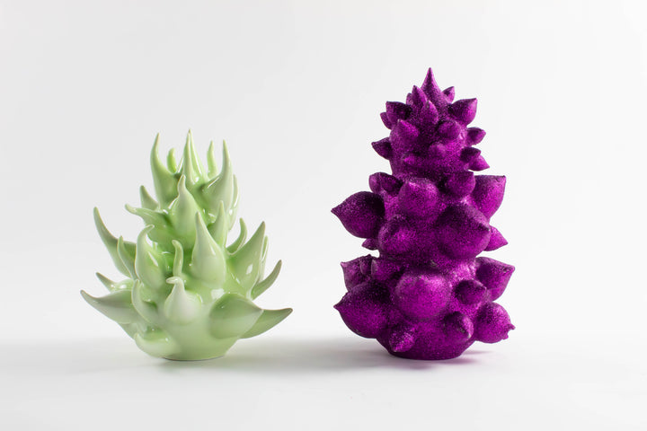 Porcelain ceramic artwork by Hugh Remar. Example pieces for an intermediate ceramics class focusing on porcelain clay making and decorating methods. 
