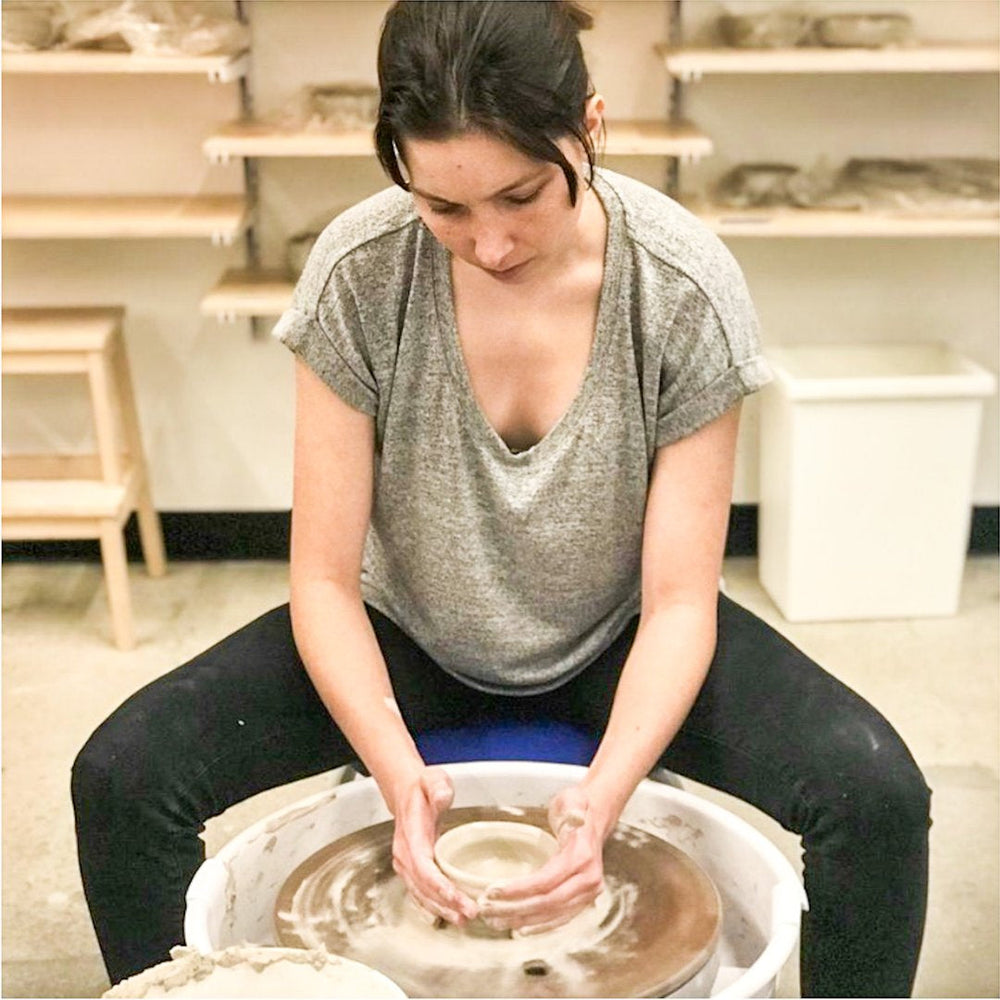 Original Workshops & Classes by Still Life Studio - woman throwing bowl on the potter's wheel